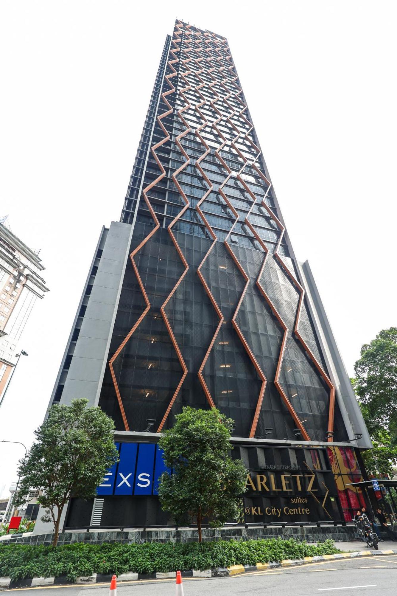 Scarletz Suites Klcc By Mykey Global Kuala Lumpur Bagian luar foto The building's facade